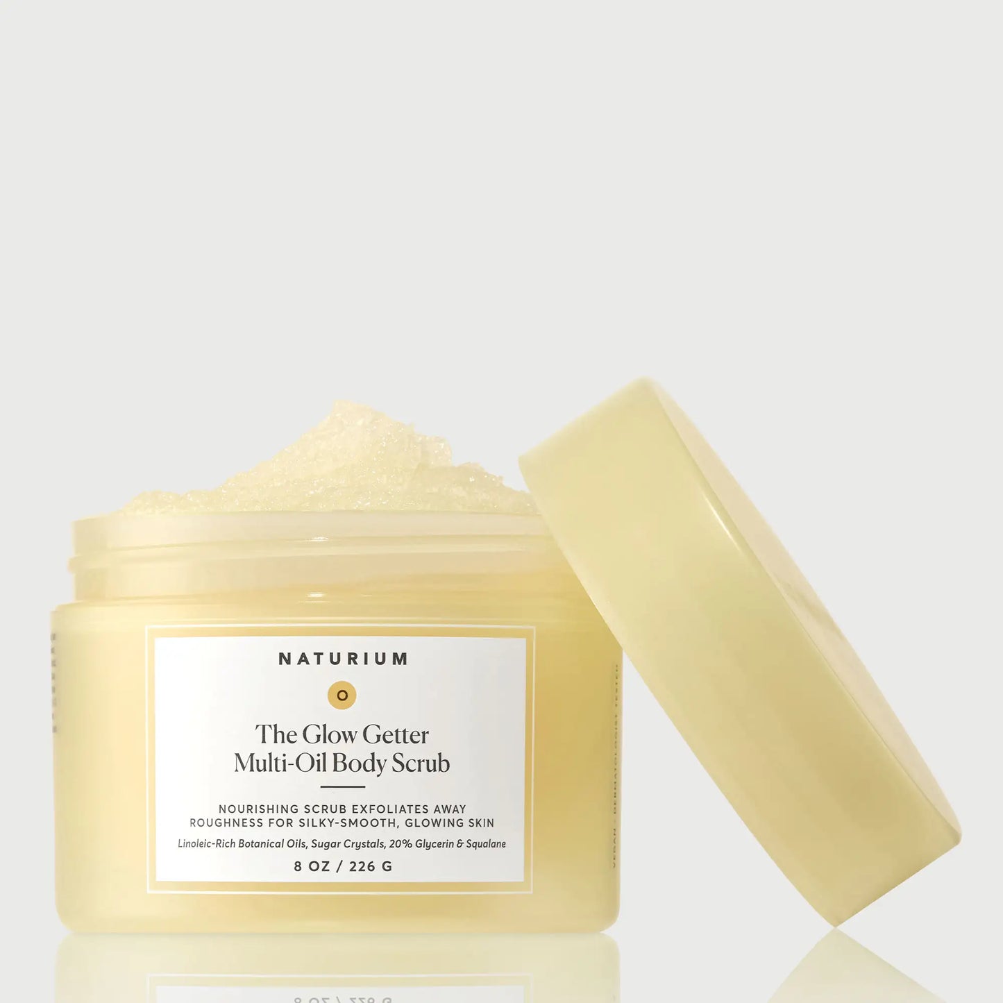 the-glow-getter-multi-oil-body-scrub-r2 NATR-40028-GlowGetter-Multi-Oil-Body-Scrub-Front-CapOff-bonebkgd.webp