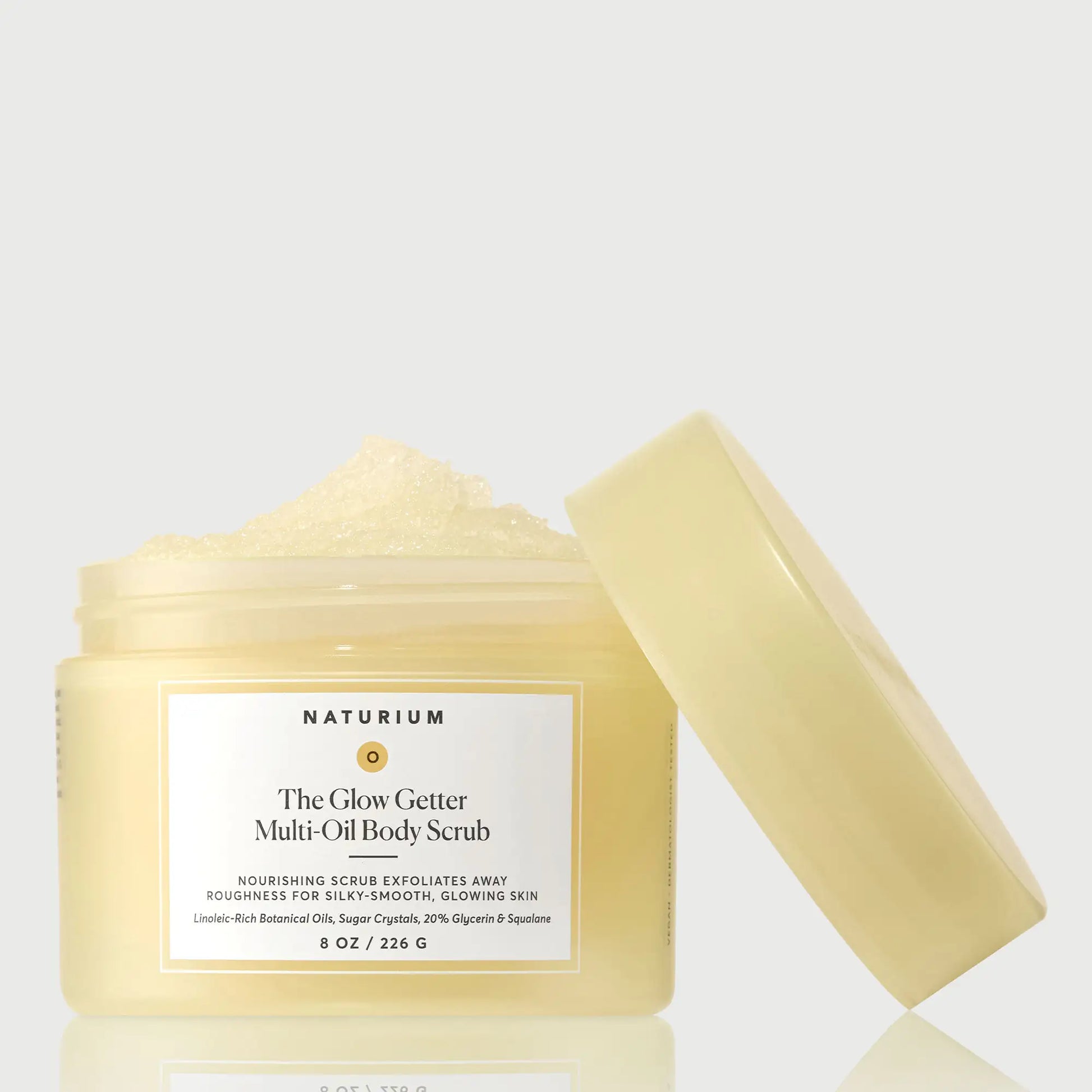 the-glow-getter-multi-oil-body-scrub-r2 NATR-40028-GlowGetter-Multi-Oil-Body-Scrub-Front-CapOff-bonebkgd.webp