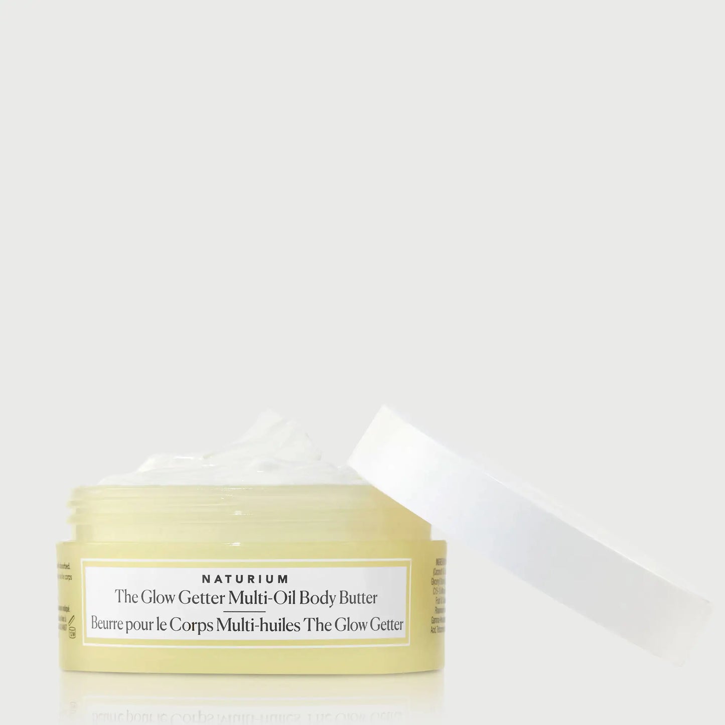 the-glow-getter-multi-oil-body-butter-travel-size-c1 NATR-40115_Glow-Getter-Body-Butter-Mini_front_capoff_bonebkgd.webp