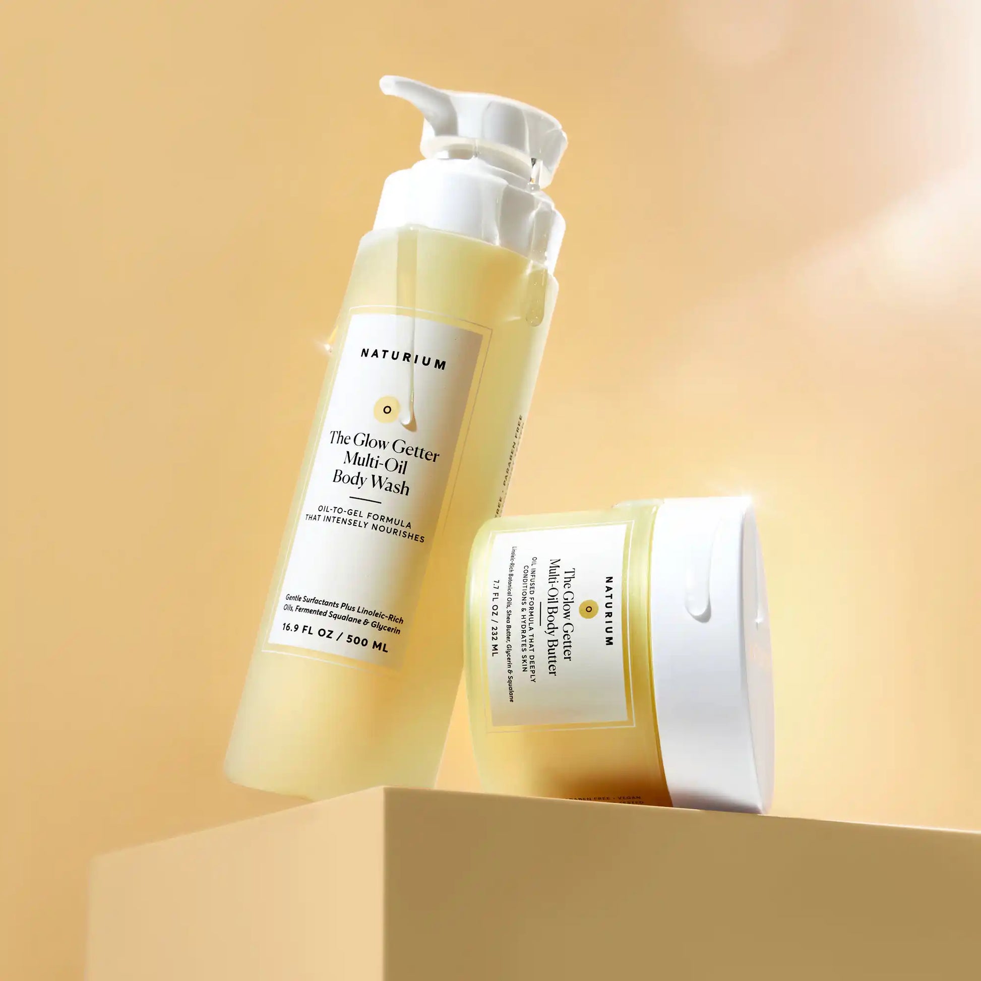the-glow-all-out-body-bundle-c1 gg-bodybutter_1464-crop_revcolor_FL.webp